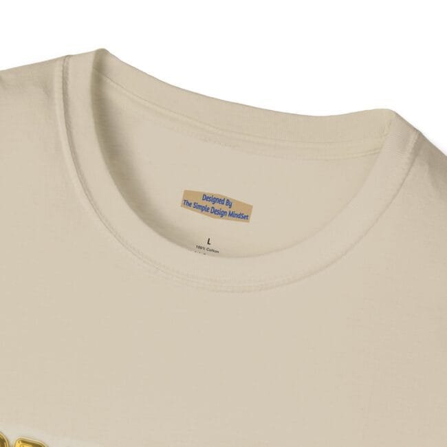 Cream-colored crew-neck T-shirt with interior label reading “Designed By The Simple Design MindSet,” size L, 100% cotton.