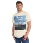 Man wearing a cream T-shirt with a large road-and-sky graphic and the text 'Walk For Your Health'.