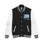 Black and white varsity jacket with striped ribbing and a small landscape patch on the chest reading 'Walk For Your Health' behind a blue sky road image.
