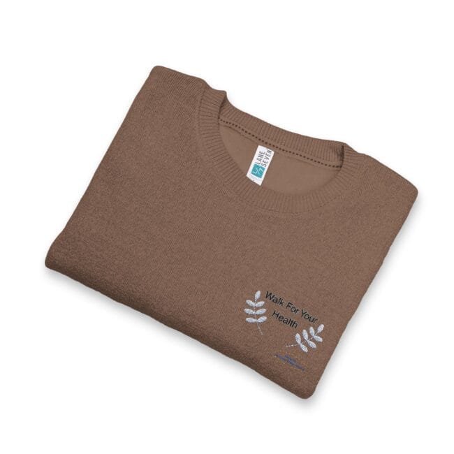 Brown folded knit sweater with embroidered white leaf design and the text 'Walk For Your Health' on the front.