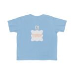 Light blue T-shirt with a white decorative back print: an orange-text line about continuous learning, plus a small square logo above the badge.
