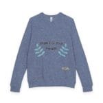 Blue sweatshirt with embroidered teal leaves forming a smile beneath the text 'Walk For Your Health'.