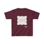 Maroon T‑shirt with a light gray decorative frame outlined in blue, containing orange text about continuous learning.