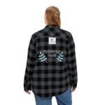 Back view of a person wearing a black-and-gray plaid flannel shirt with embroidery reading 'Walk For Your Health' and blue leaf designs.