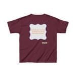 Maroon T-shirt back with a pale blue decorative frame and orange text: 'Continuous learning is improving your culture's mindset'; small label reads 'Designed by The Simple Design Mindset'