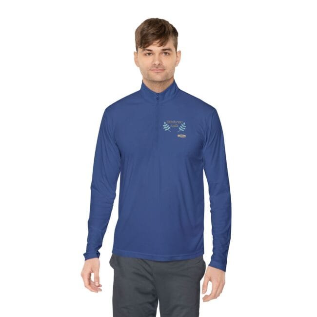 Man wearing a blue long-sleeve athletic shirt with a small logo on the chest, standing against a white background.