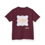 Maroon t-shirt featuring a light blue decorative frame with the quote: 'Continuous learning is improving your culture's mindset' in orange text in the center.