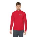 Man wearing a red long-sleeve athletic shirt with a small chest logo, standing against a white background.