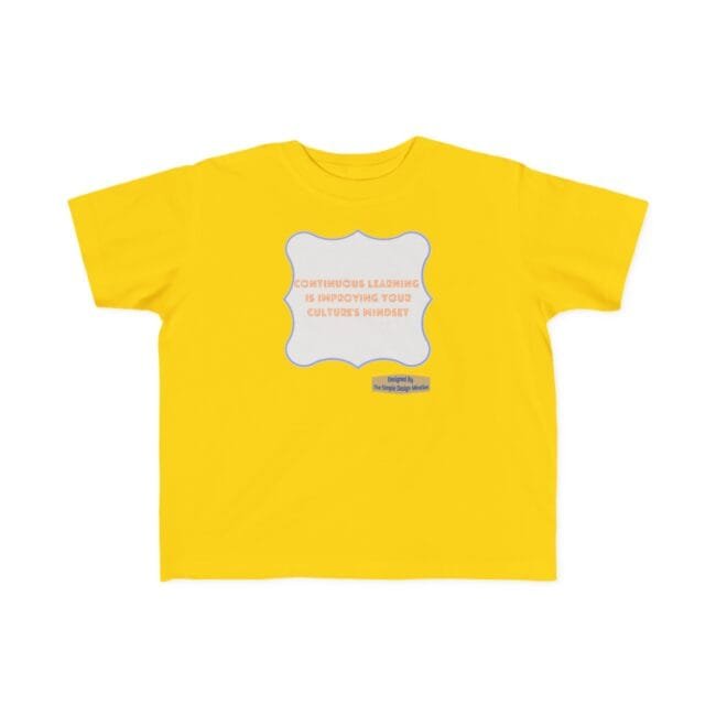 Yellow T-shirt with a pale gray decorative badge centered on the chest, orange text reading 'CONTINUOUS LEARNING IS IMPROVING YOUR CULTURE'S MINDSET' and a small designer credit below.