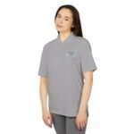 Woman in a light gray polo shirt with a blue laurel logo and 'Walk For Your Health' text on the chest.