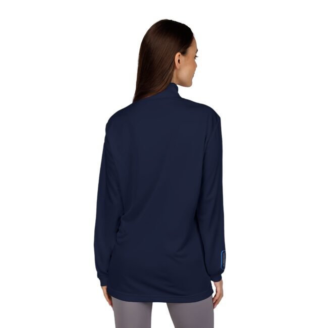 Back view of a woman wearing a navy blue long-sleeve jacket that falls to hip length; small blue loop tag on the left cuff.