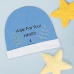 Blue circular booklet cover showing the words 'Walk For Your Health' with leaf illustrations, beside a yellow knitted star on a light blue background.