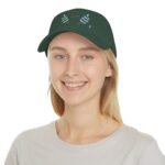 Smiling person wearing a dark green cap with the slogan 'Walk For Your Health' and blue laurel embroidery on the front.