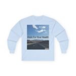 Light-blue T-shirt with a vertical poster showing a mountain road landscape and the caption 'Walk For Your Health'