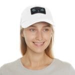 Close-up of a smiling person wearing a white baseball cap with a black patch reading 'Walk For Your Health' on the front.