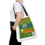 Person in a white shirt carries a white tote bag displaying a green poster promoting the 2026 World Cup.