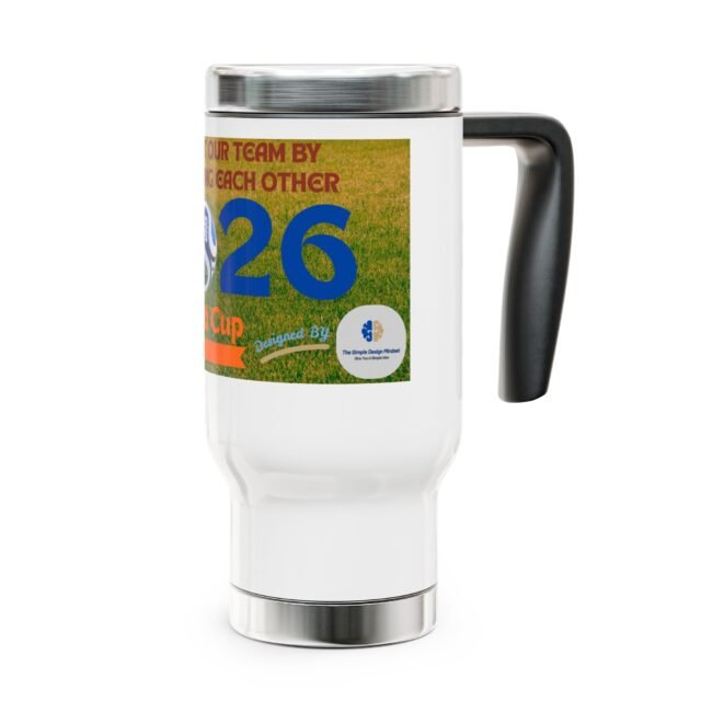 White ceramic mug with a colorful poster-style label featuring a large blue 26, viewed from the side with a black handle