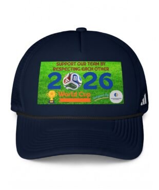 Close-up of a navy baseball cap with a bright green sticker on the front, showing part of the text and designs behind a curved brim.