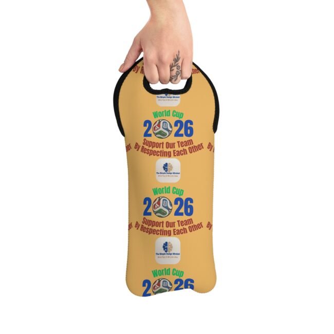 Hand gripping a yellow round paddle with World Cup 2026 branding and a small logo in the center