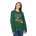 Young woman in a green sweatshirt with a large colorful graphic on the chest, standing against a white background.