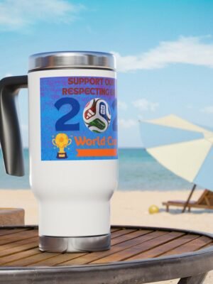817903118364756459_2048jpeg | the Mindset Designed White Insulated Mug with a Blue World Cup Sticker on a Beach Table, Ocean in the Background.